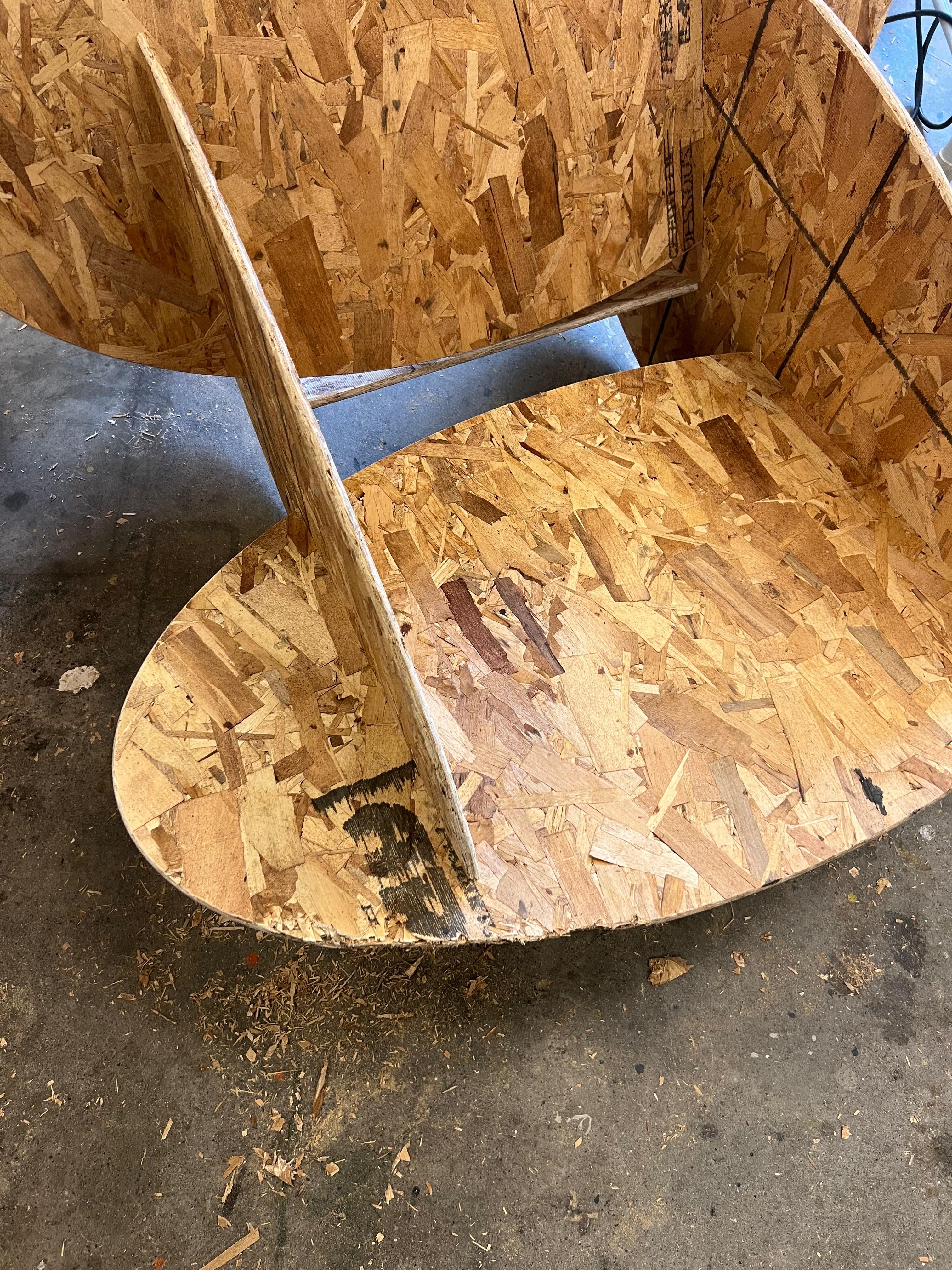 Damaged OSB chair parts after hammer adjustments